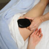 large hot stone for the legs and gluteal region